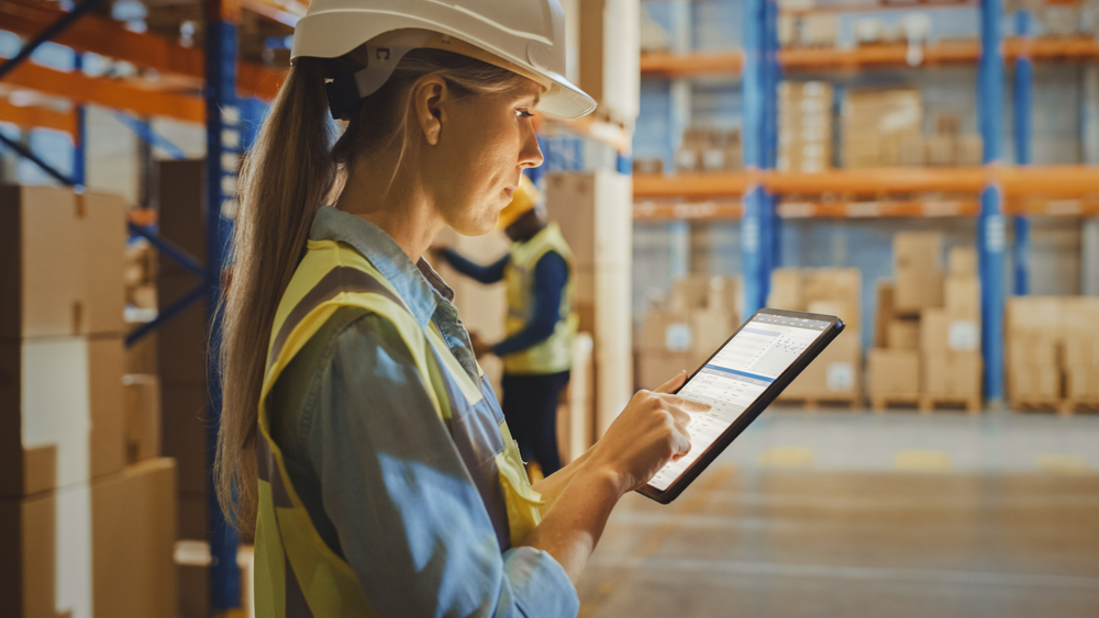 Professional,Female,Worker,Wearing,Hard,Hat,Uses,Digital,Tablet,Computer